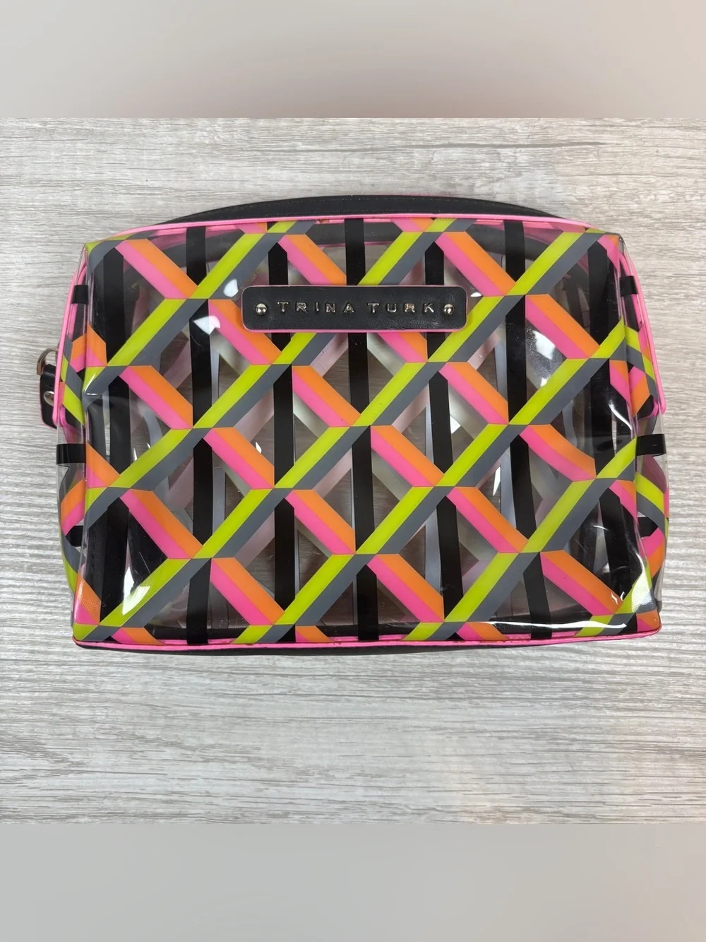 Trina Turk cosmetic bag colorful neon geometric pattern